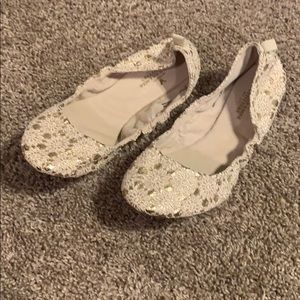 AE gold and white ballet flats